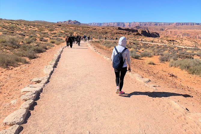 Antelope Canyon and Horseshoe Bend Day Trip from Las Vegas - Horseshoe Bend: walking out to the Colorado River