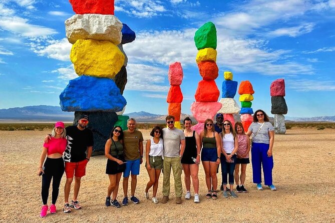 Hoover Dam Walk-On-Top Tour w/ Seven Magic Mountains & Vegas Sign - Start strong at the Welcome to Las Vegas sign (15 minutes that pay off)